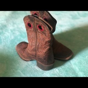 Little boys Ariat cowboy boots.